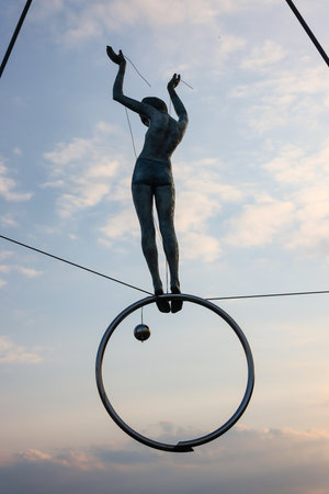 Cracow, Poland - May 2, 2022: Balancing sculptures between sky and water by Jerzy Kedziora over the Kornatka footbridge over the Vistula River in Krakowのeditorial素材