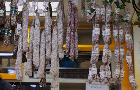 Cremona, Italy - September 7, 2022: Traditional meat products sold at a street stall during the farmers market in Cremona, Lombardy, Italyのeditorial素材
