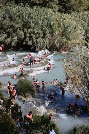 Saturnia, Italy - September 13, 2022: People are bathing in the hot springs of Saturnia Therme, Saturnia, Tuscany, Italyのeditorial素材
