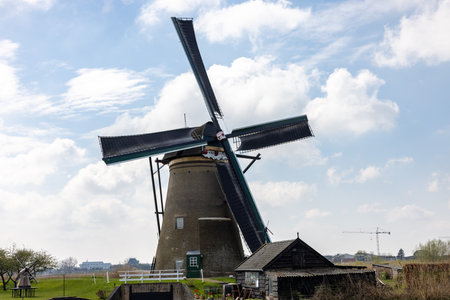 One of the 19 windmills at Kinderdijk in the Netherlands. Built about 1740, this is the largest of windmills in the Netherlands, a UNESCO world heritage site.のeditorial素材