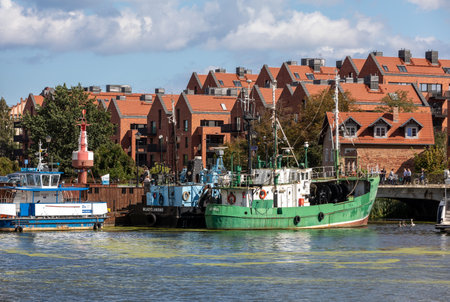 Gdansk, Poland - September 6, 2020: Fishing boats and tugs moored in the port on the MotÅawa River in Gdansk. Polandのeditorial素材