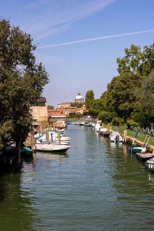 Venice, Italy - Sept 6, 2022: 59th A typical Venetian canal situated in the grounds of the Giardnini garden in Veniceのeditorial素材