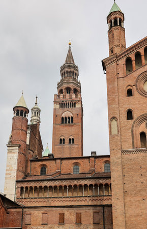 Cathedral of Cremona or Cathedral of Santa Maria Assunta and the Medieval Bell Tower of Cremona known as the Torrazzo, Lombardy, Italy.の写真素材