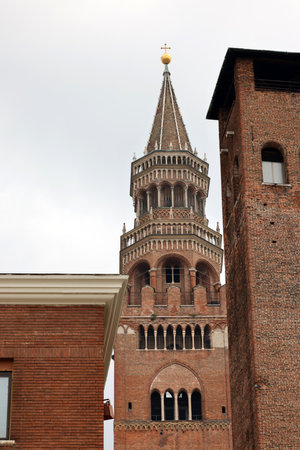 the Medieval Bell Tower of Cremona known as the Torrazzo, Lombardy, Italy.の写真素材