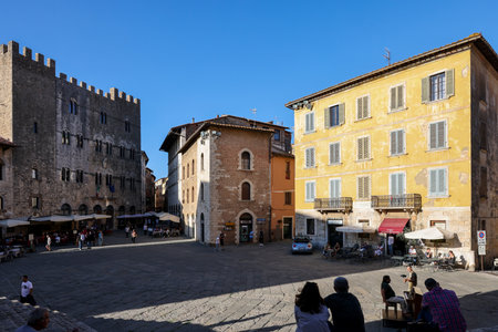 Massa Marittima, Italy - Sept 11, 2022: Garibaldi square and Palazzo del Podesta in Massa Marittima. Italyのeditorial素材
