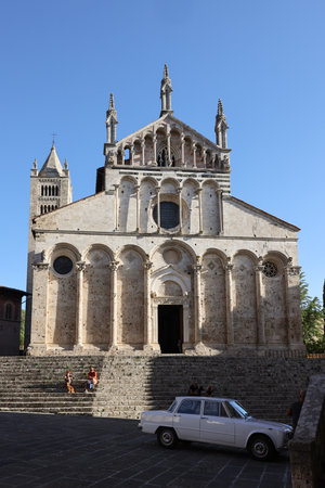 Massa Marittima, Italy - Sept 11, 2022: the Cathedral of Saint Cerbonius with Bell tower at the Garibaldi square in Massa Marittima. Italyのeditorial素材