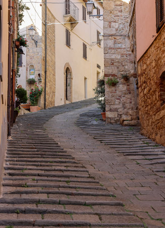 Massa Marittima, Italy - Sept 11, 2022: Steep and narrow street in old town of Massa Marittima, Italyのeditorial素材