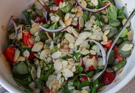 salad with strawberries and broad beans. Delicious dish in a healthy styleの写真素材