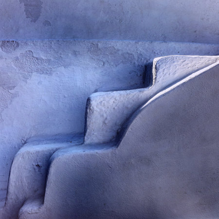 Narrow stone steps, a traditional piece of architecture on the island of Santorini. Greeceの写真素材