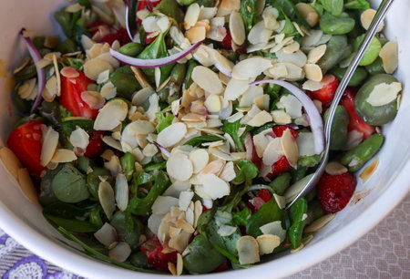salad with strawberries and broad beans. Delicious dish in a healthy styleの写真素材