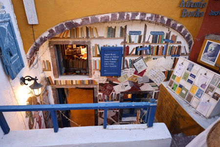 Oia, Santorini, Greece - June 28, 2021: Atlantis Books, a bookshop on the main street of Oia, Santorin, Greeceのeditorial素材