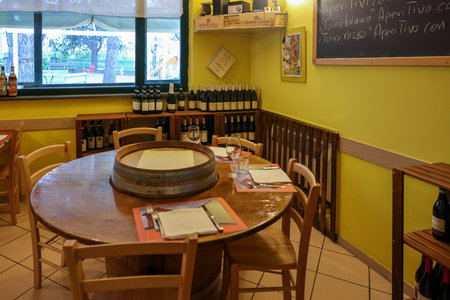 Albaretto della Torre; Italy - Sept 7, 2022: The interior of the family restaurant Ristoro La Torre in Albaretto della Torre with great Piedmont cuisineのeditorial素材