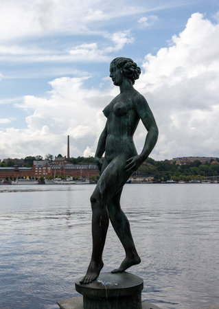 Stockholm, Sweden - July 25, 2023: The Dansen (the dance) statue sculpture in the gardens of the City Hall, Stadshuset of Stockholm. By Carl Eldhのeditorial素材