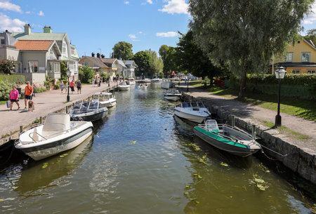 Trosa, Sweden - July 29, 2023: View of the Trosa river with moored pleasure boats in the picturesque seaside town of Trosa in SÃ¶dermanland. Sweden.のeditorial素材
