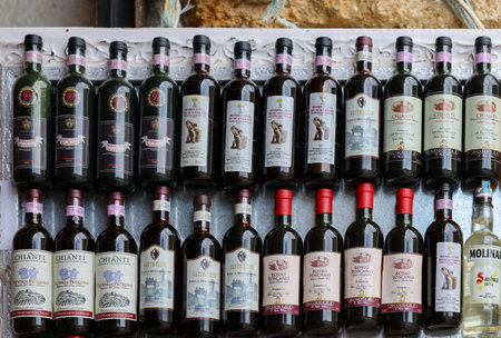 Monteriggioni, Italy - Sept 17, 2022: Neatly arranged bottles of Chianti Classico wine in a wine shop in Monteriggioni near Siena. Italyのeditorial素材
