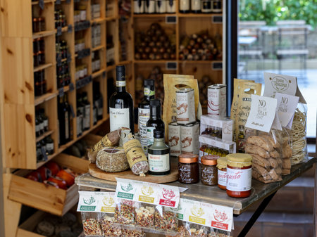 Monteriggioni, Italy - Sept 17, 2022: Shop with traditional Italian products in Monteriggioni medieval walled town near Siena in Tuscany, Italyのeditorial素材