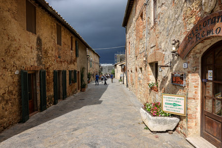 Monteriggioni, Italy - Sept 17, 2022: Picturesque street in Monteriggioni medieval walled town near Siena in Tuscany, Italyのeditorial素材