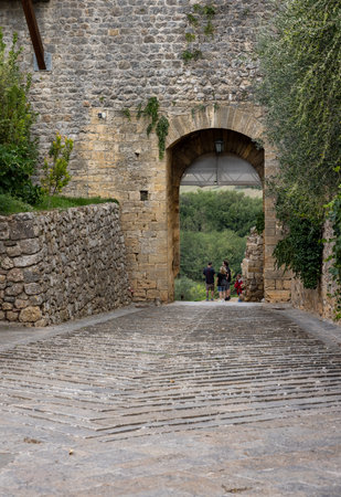 Monteriggioni, Italy - Sept 17, 2022: Porta Fiorentina city gate in Monteriggioni medieval walled town near Siena in Tuscany, Italyのeditorial素材