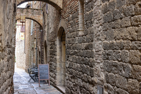 San Gimignano, Italy - Sept 17, 2022: The medieval atmosphere of the streets in San Gimignano. Tuscany, Italyのeditorial素材