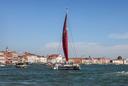Venice, Italy - September 5, 2022: Catamaran sailing along the San Marco Canal in Venice, Italyのeditorial素材