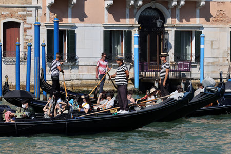 Venice, Italy - September 5, 2022: Tourists during a Gondola cruise on the Grand Canal in Venice. Italyのeditorial素材
