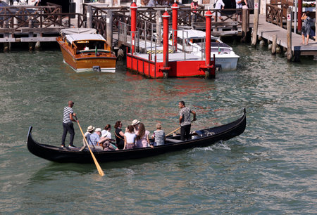 Venice, Italy - September 5, 2022: Tourists during a Gondola cruise on the Grand Canal in Venice. Italyのeditorial素材