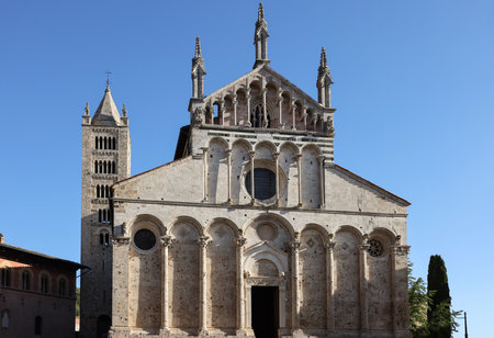 The Cathedral of Saint Cerbonius with Bell tower at the Garibaldi square in Massa Marittima. Italyの写真素材