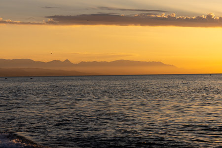 View from Torremolinos towards Malaga at sunrise. Costa del Sol, Spain.の写真素材