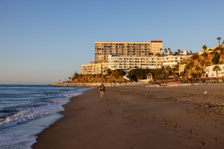 Torremolinos, Spain - September 12, 2023: View of Bajondillo Beach and hotels in Torremolinos at sunrise. Costa del Sol, Spain.のeditorial素材