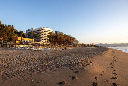 Torremolinos, Spain - September 12, 2023: View of Bajondillo Beach and hotels in Torremolinos at sunrise. Costa del Sol, Spain.のeditorial素材