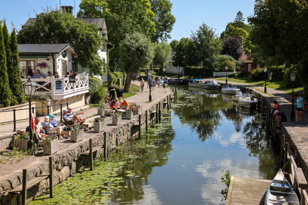 Trosa, Sweden - July 29, 2023: View of the Trosa river with moored pleasure boats in the picturesque seaside town of Trosa in SÃ¶dermanland. Sweden.のeditorial素材