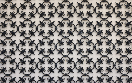 Detail of an ancient window with grating in wrought iron. Venice, Italy,の写真素材