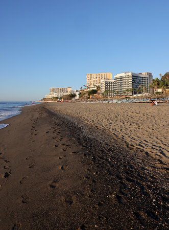 Torremolinos, Spain - September 12, 2023: View of Bajondillo Beach and hotels in Torremolinos at sunrise. Costa del Sol, Spain.のeditorial素材