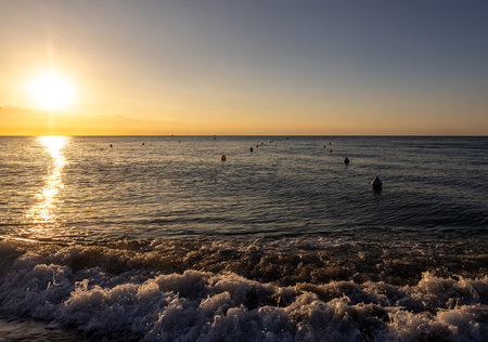 Sunrise over the Mediterranean Sea seen from the beach in Torremolinos. Costa del Sol, Spainの写真素材