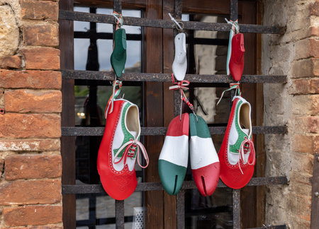 Monteriggioni, Italy - Sept 17, 2022: Decoration of a shoe store in a retro atmosphere and national...