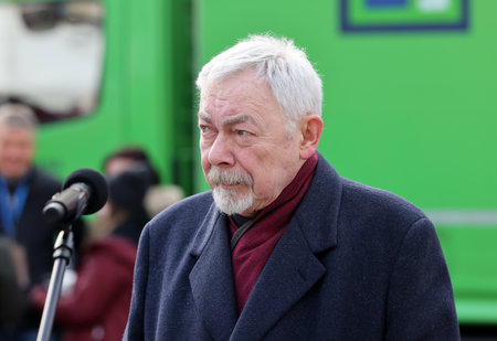 Cracow, Poland - Dec 17, 2023: President of Krakow Jacek Majchrowski participates in the Christmas Eve for the poor and homeless on the Main Square in Cracow.のeditorial素材