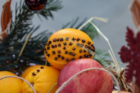 A beautifully decorated wicker basket full of fruitの写真素材