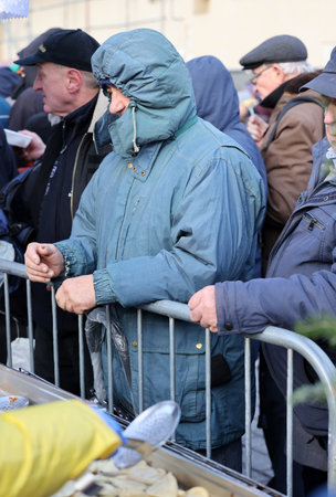 Krakow, Poland - Dec 17, 2023: Christmas Eve for the poor and homeless on the Main Square in Cracow. The group Kosciuszko prepares the greatest eve in the open air in Krakowのeditorial素材