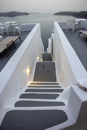Narrow stone steps, a traditional piece of architecture on the island of Santorini. Greeceの写真素材