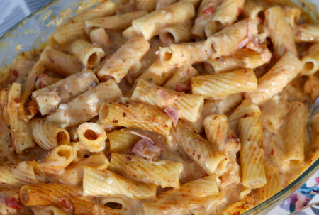 baked pasta with ham in bÃ©chamel sauceの写真素材
