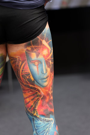 Krakow, Poland - June 12, 2022: Unidentified participant during the contest for the best tattoo at the 15th Tattoofest Convention in Cracow. One of the most prestigious tattoo festivals.のeditorial素材