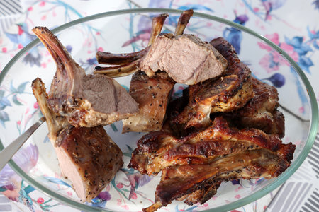 Baked, ready-to-eat saddle of lamb in a glass dishの写真素材
