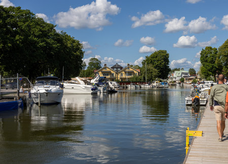 Trosa, Sweden - July 29, 2023: View of the Trosa river with moored pleasure boats in the picturesque seaside town of Trosa in SÃ¶dermanland. Sweden.のeditorial素材