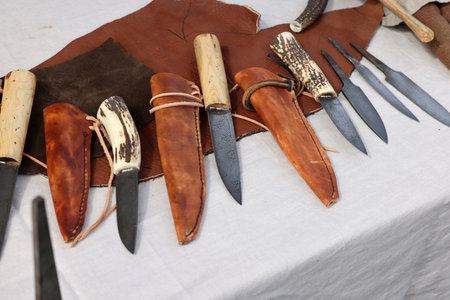 Cracow, Poland - April 11, 2023: Handmade imitations of medieval knives in knight camp at the...