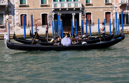 Venice, Italy - September 5, 2022: Tourists during a Gondola cruise on the Grand Canal in Venice. Italyのeditorial素材