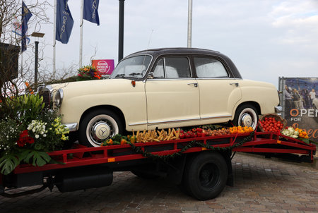 Noordwijk, Netherlands - April 22, 2023: Cars decorated with flowers taking part in the Bloemencorso Bollenstreek the annual spring flower parade from Noordwijk to Haarlem in the Netherlands.のeditorial素材