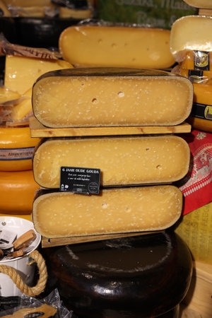 Gouda, the Nehterlands - April 20, 2023: Display of traditional Dutch cheese at local cheese shop in...