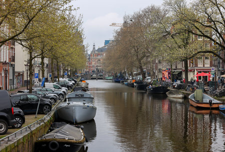 Amsterdam, Netherlands - April 21, 2023: The canal and architecture typical of the center of Amsterdam in the area of the Rijksmuseumのeditorial素材