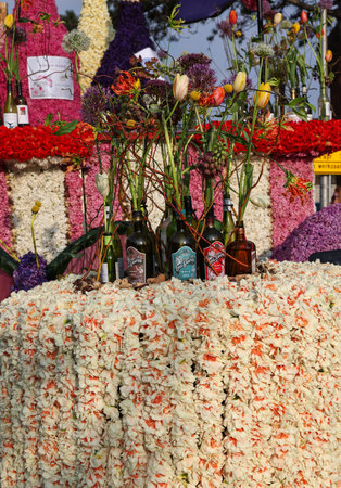 Noordwijkerhout, Netherlands - April 21, 2023: Drinks bar made of tulips and hyacinths presented before the evening illuminated Flower Parade Bollenstreek in Noordwijkerhoutのeditorial素材