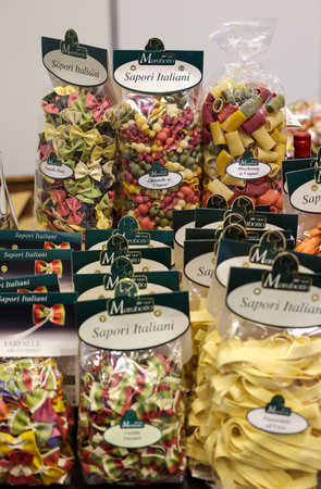 Cracow, Poland - November 3, 2021: Variety of types, shapes and colors of Italian pasta at Enoexpo and Gastrofood - Trade Fair for Food and Drinks for Cateringのeditorial素材